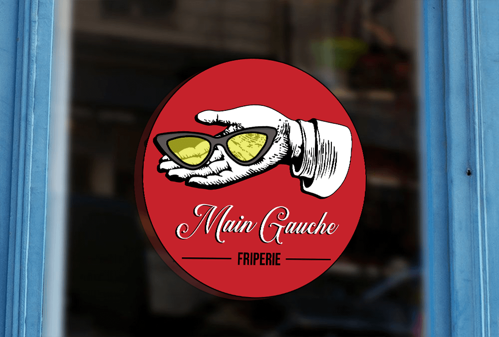 LOGO MAIN GAUCHE - friperie graphiste freelance nancy - LOGO créé par Mogo graphiste MAIN GAUCHE - friperie